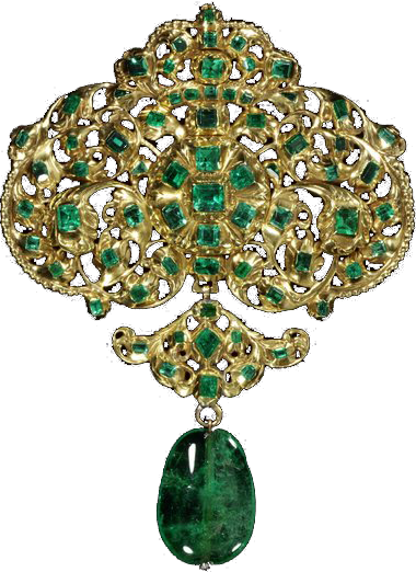 Large green gem attached to intricate gold jewelry.