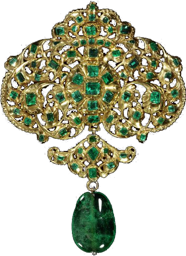 Large green gem attached to intricate gold jewelry.